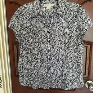 A Michael Kors blouse. Its soft stylish and fun.